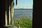 Озеро Сенеж из окна заброшенного домика